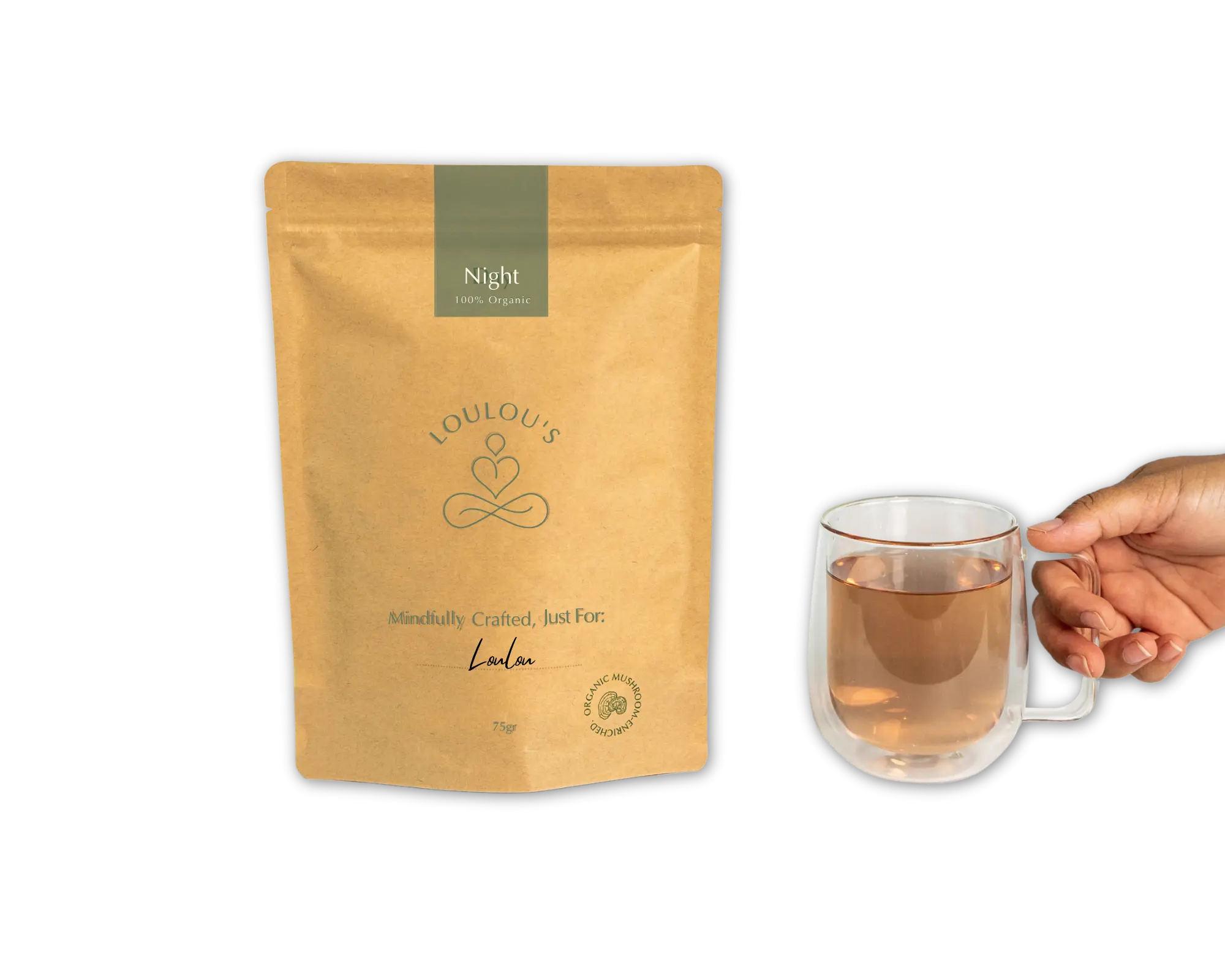 Loulou's personalised Night tea blend pouch with brewed tea in double-walled glass cup