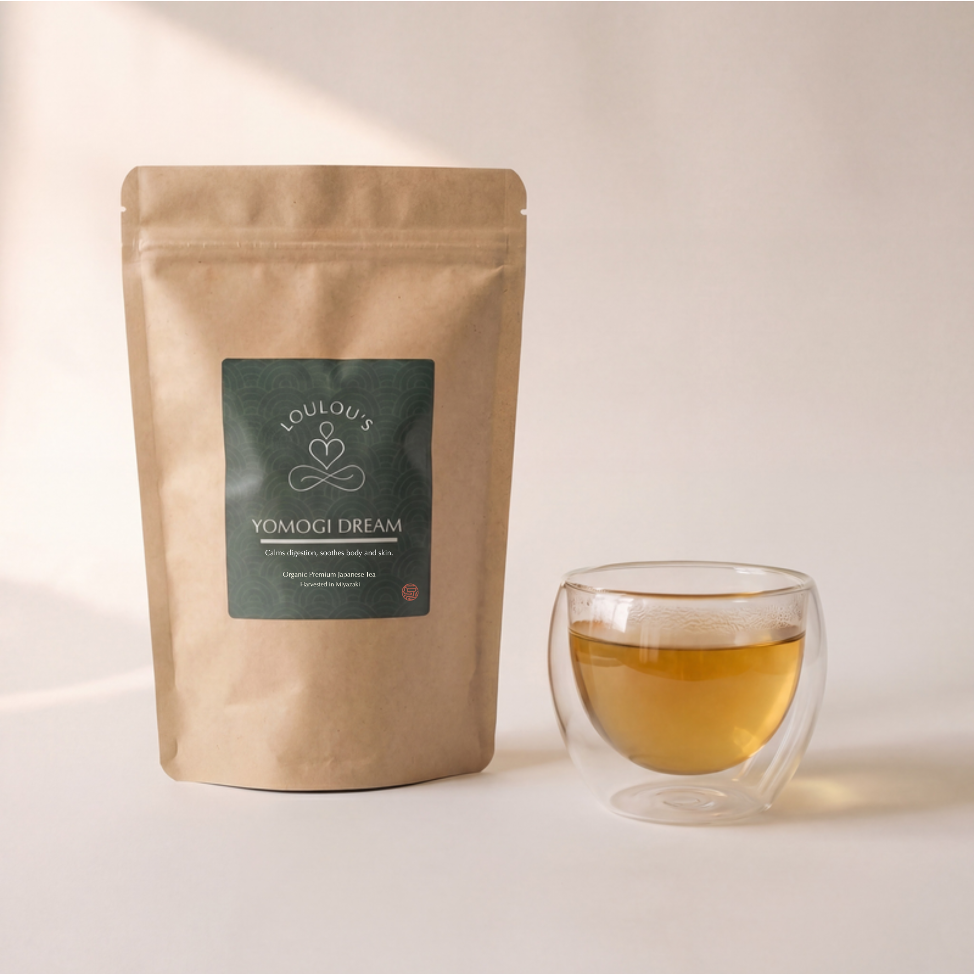Yomogi Dream organic Japanese mugwort sleep tea pouch with brewed cup — calming Reishi and botanical blend by Loulou's Tea